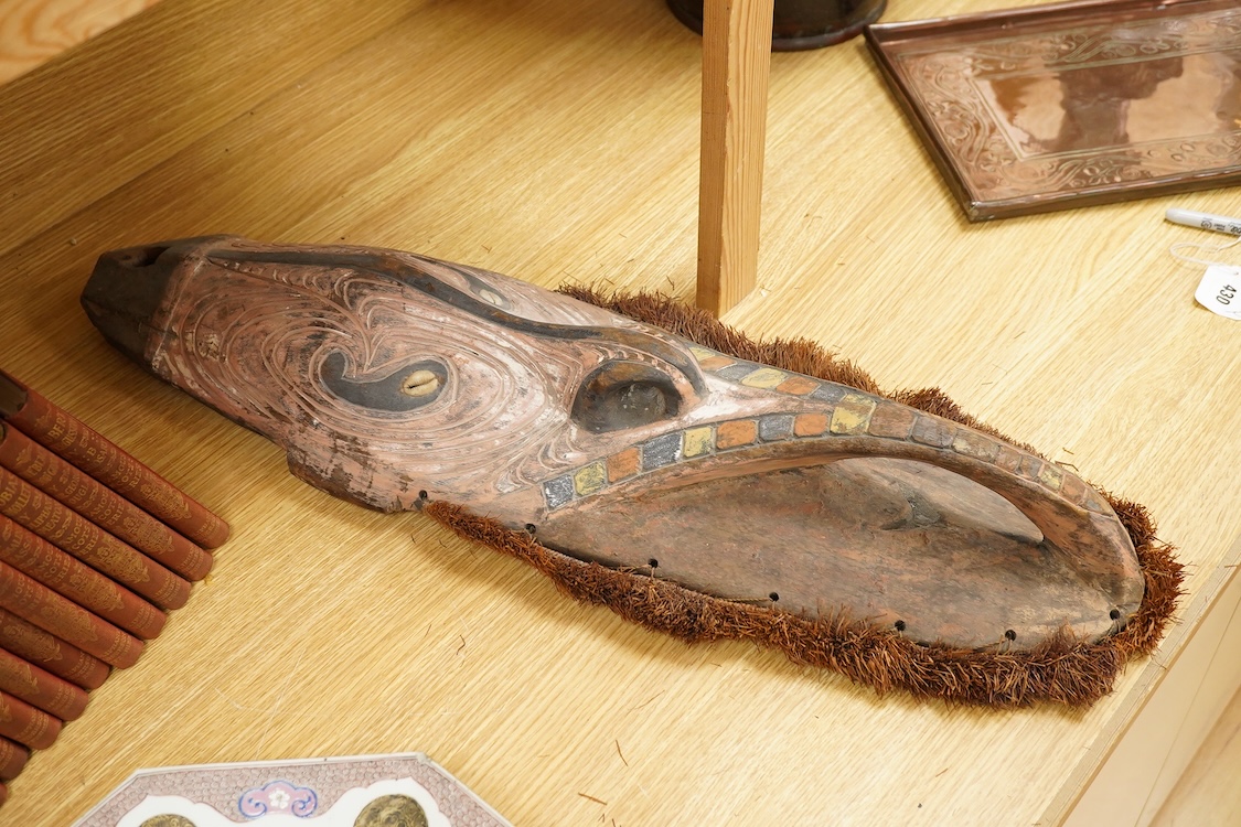 Oceanic tribal art interest; a Papua New Guinea carved and painted mask, 70cm